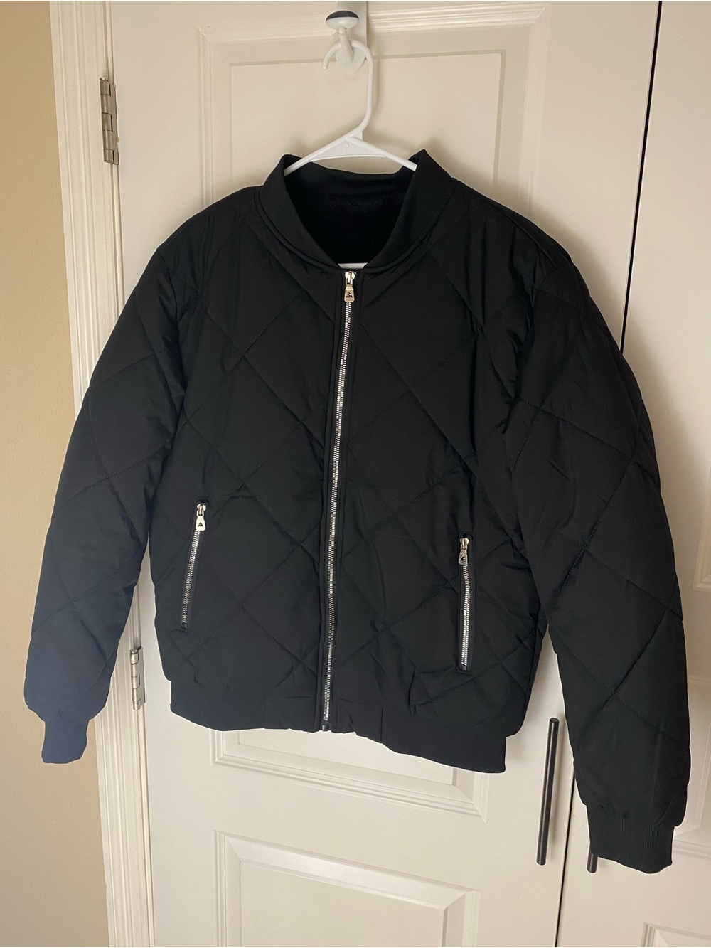 Manfinity Men's Black Quilted Puffer Jacket with Zip Pockets - Size S